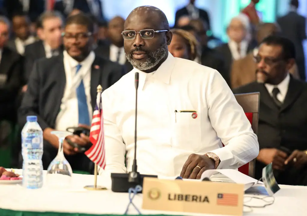 Liberian President, George Weah attends the fifty-sixth ordinary session of the Economic Community of West African States in Abuja on December 21, 2019. (Photo by Kola SULAIMON / AFP)