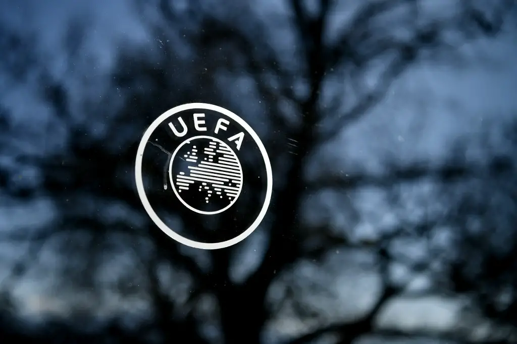 This picture shows the UEFA logo at the organization's headquarters in Nyon on Febraury 28, 2020. (Photo by Fabrice COFFRINI / AFP)