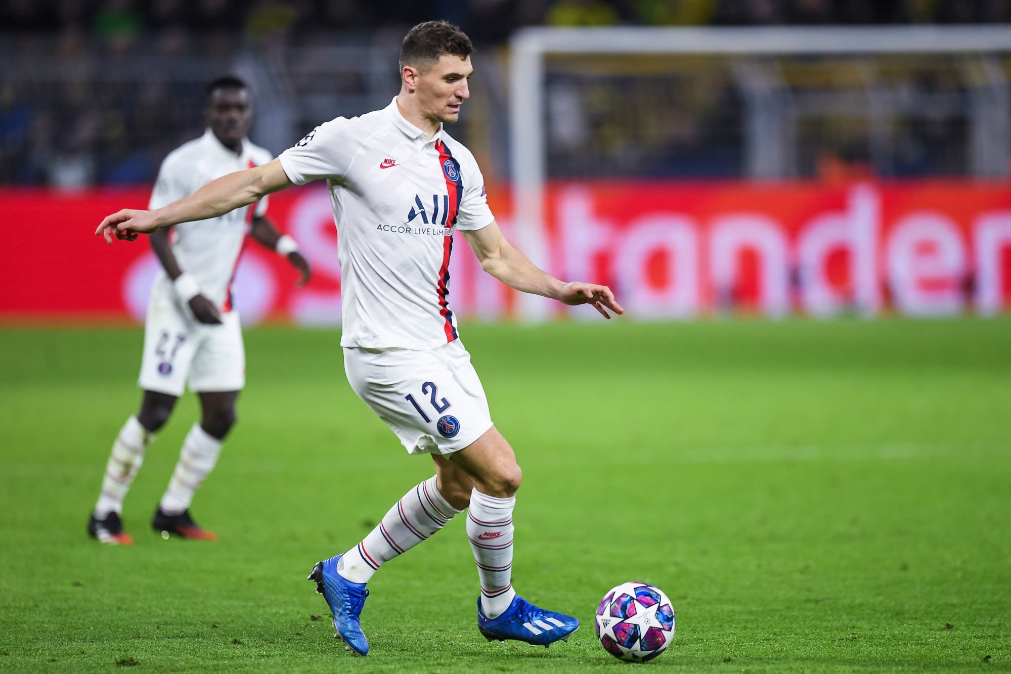 Photo by Baptiste Fernandez/Icon Sport - Thomas MEUNIER - Idrissa GUEYE - Signal Iduna Park - Dortmund (Allemagne)