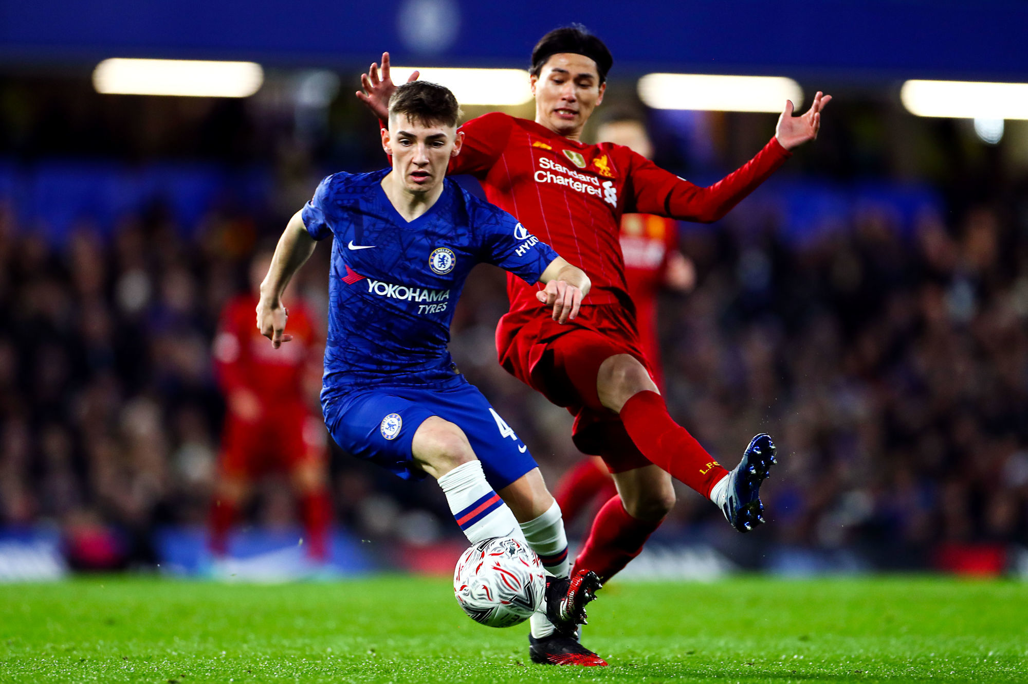 Liverpool's Takumi Minamino (right) and Chelsea's Billy Gilmour battle for the ball 


Photo by Icon Sport - Stamford Bridge - Londres (Angleterre)
