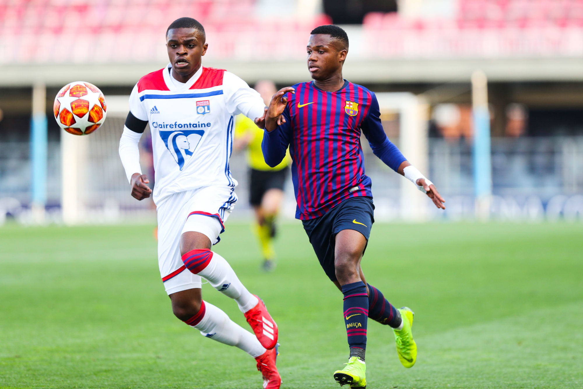 Pierre Kalulu - Lyon et Anssumane Fati - Barcelona 
Photo : Marca / Icon Sport