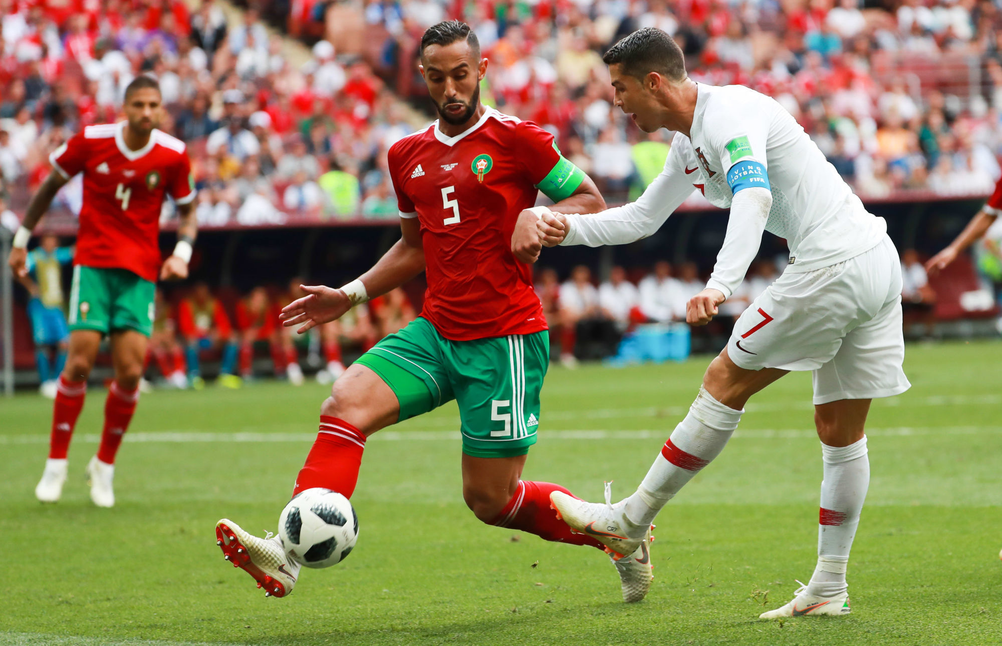 5544881 20.06.2018 Portugal's Cristiano Ronaldo, right, and Morocco's Mehdi Benatia struggle for a ball during the World Cup Group B soccer match between Portugal and Morocco at the Luzhniki stadium, in Moscow, Russia, June 20, 2018. Vitaliy Belousov / Sputnik / Icon Sport