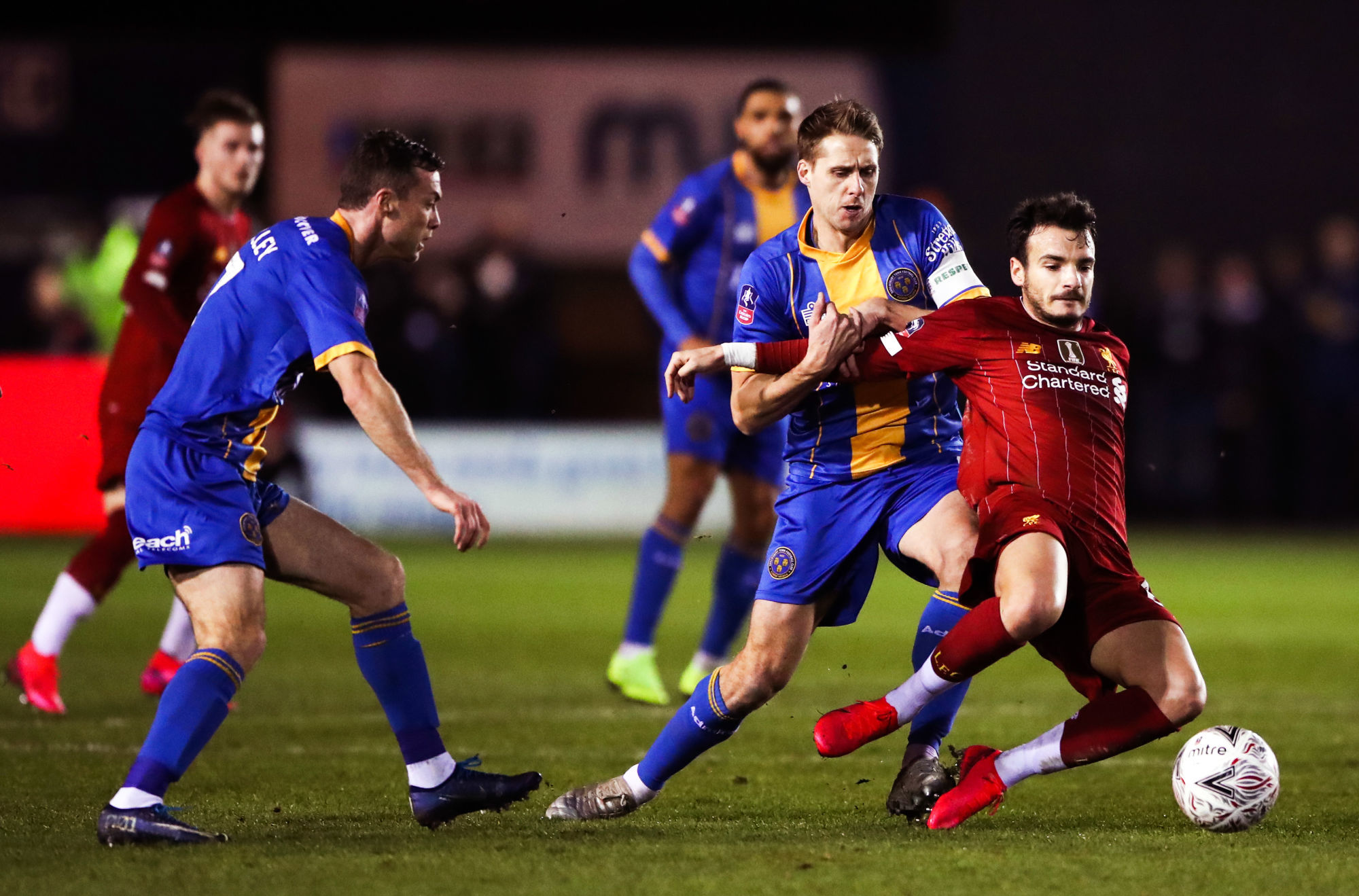 Liverpool's Pedro Chirivella (right) and Shrewsbury Town's David Edwards battle for the ball during the FA Cup fourth round match at Montgomery Waters Meadow, Shrewsbury. 

Photo by Icon Sport - David EDWARDS - Pedro CHIRIVELLA -  (Angleterre)