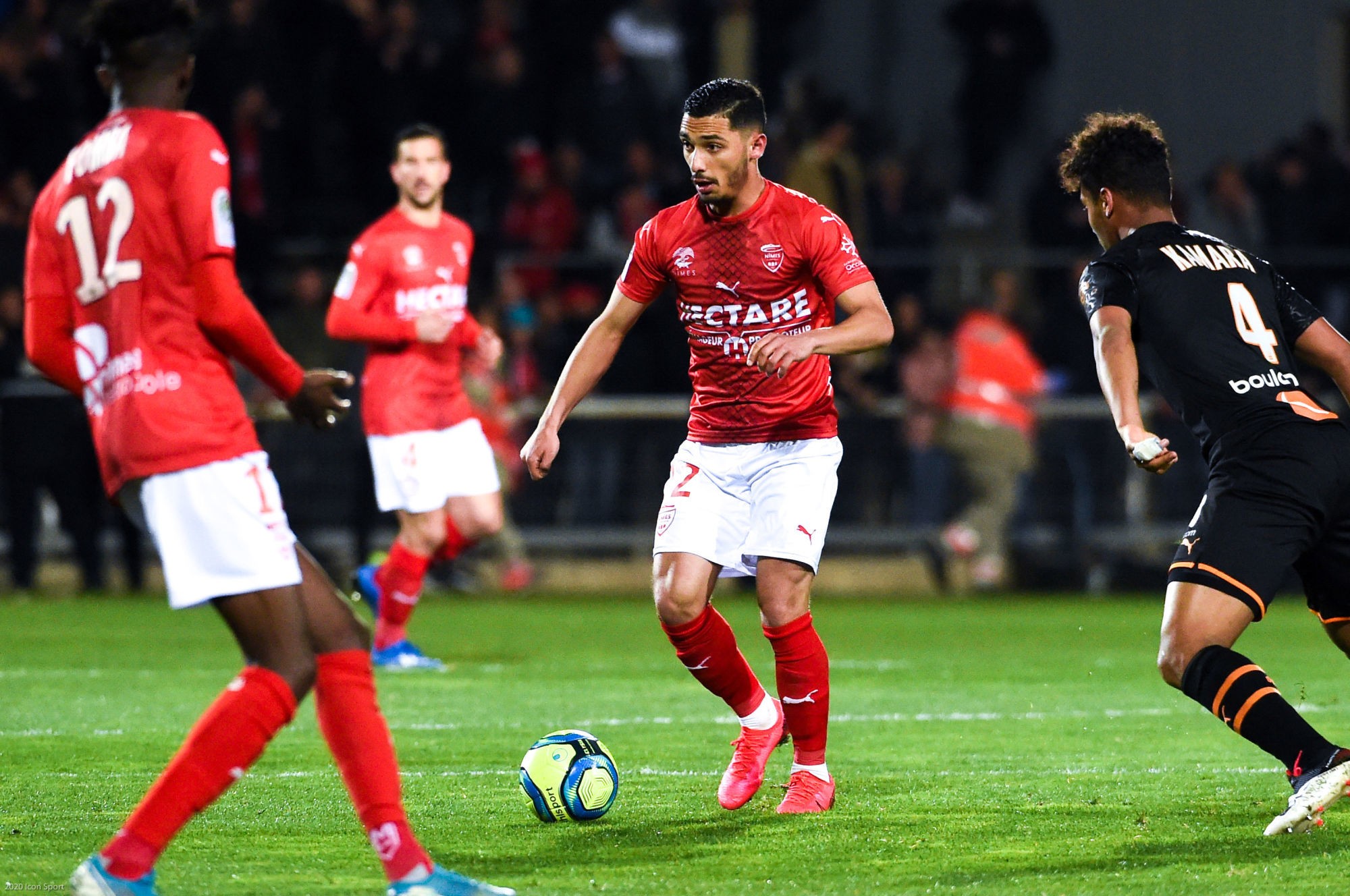 Yassine BENRAHOU of Nimes  during the Ligue 1 match between Nimes Olympique and Olympique Marseille at Stade des Costieres on February 28, 2020 in Nimes, France. (Photo by Alexandre Dimou/Icon Sport) - Yassine BENRAHOU - Stade des Costières - Nimes (France)