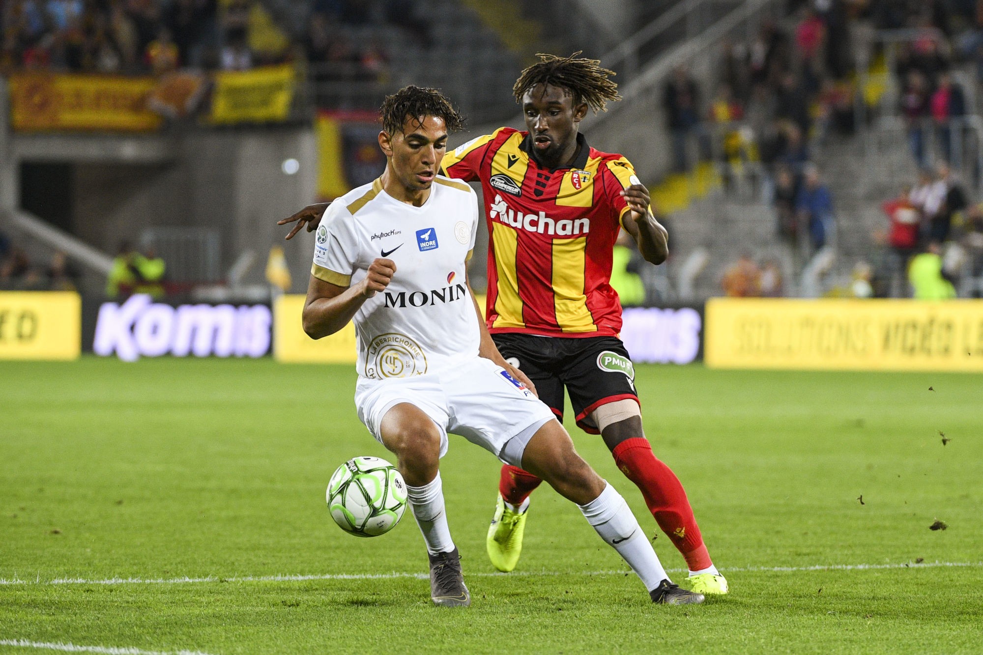 Ilyas Chouaref of Chateauroux and Charles BOLI of Lens during the Ligue 2 match between Lens and Chateauroux at Stade Bollaert-Delelis on September 16, 2019 in Lens, France. (Photo by Aude Alcover/Icon Sport) - Charles BOLI - Ilyas CHOUAREF - Stade Bollaert-Delelis - Lens (France)