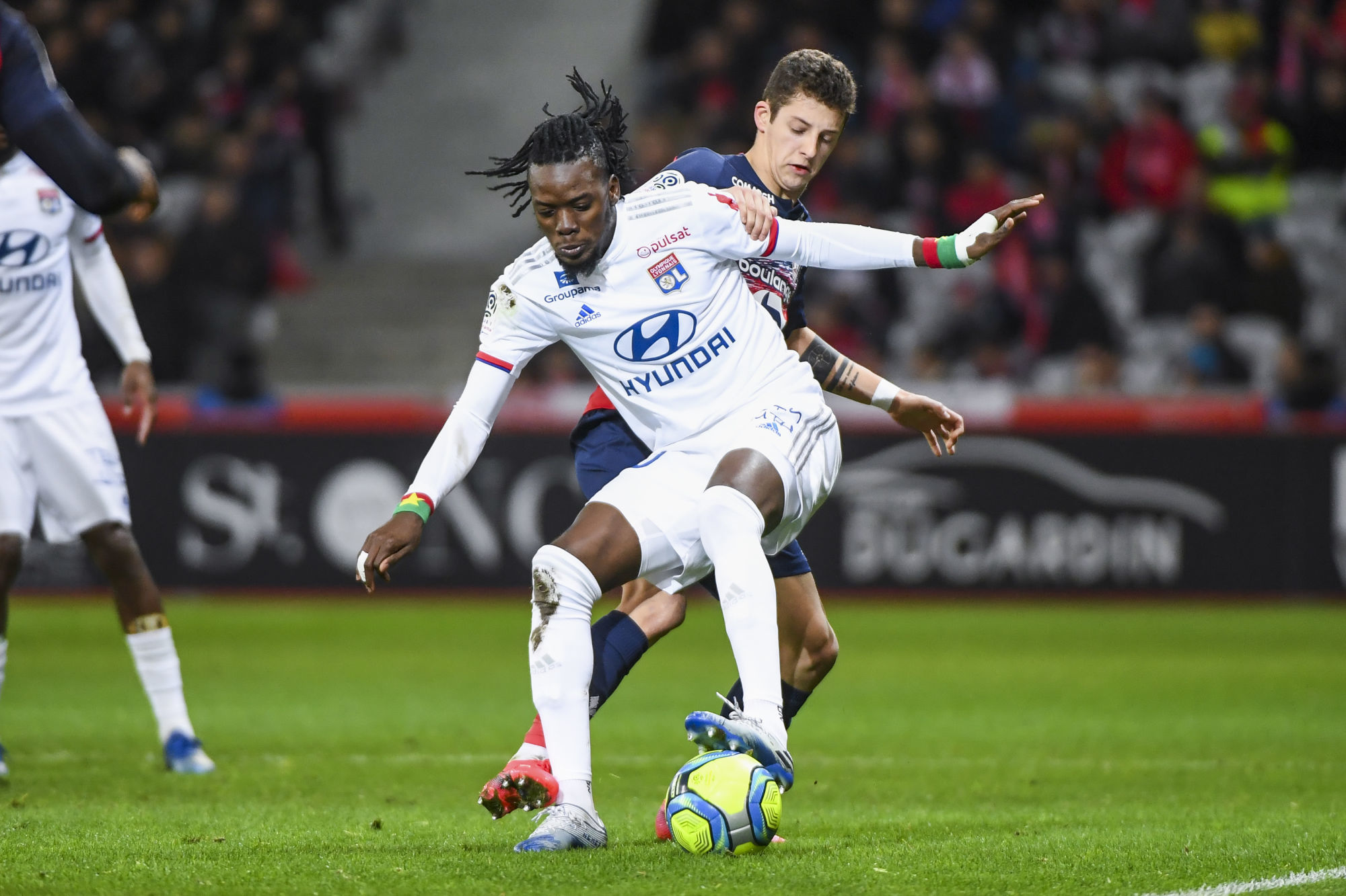 Bertrand TRAORE of Olympique Lyonnais and Domagoj BRADARIC of Lille during the Ligue 1 match between Lille and Lyon at Stade Pierre-Mauroy on March 8, 2020 in Lille, France. (Photo by Aude Alcover/Icon Sport) - Bertrand TRAORE - Domagoj BRADARIC - Stade Pierre Mauroy - Lille (France)