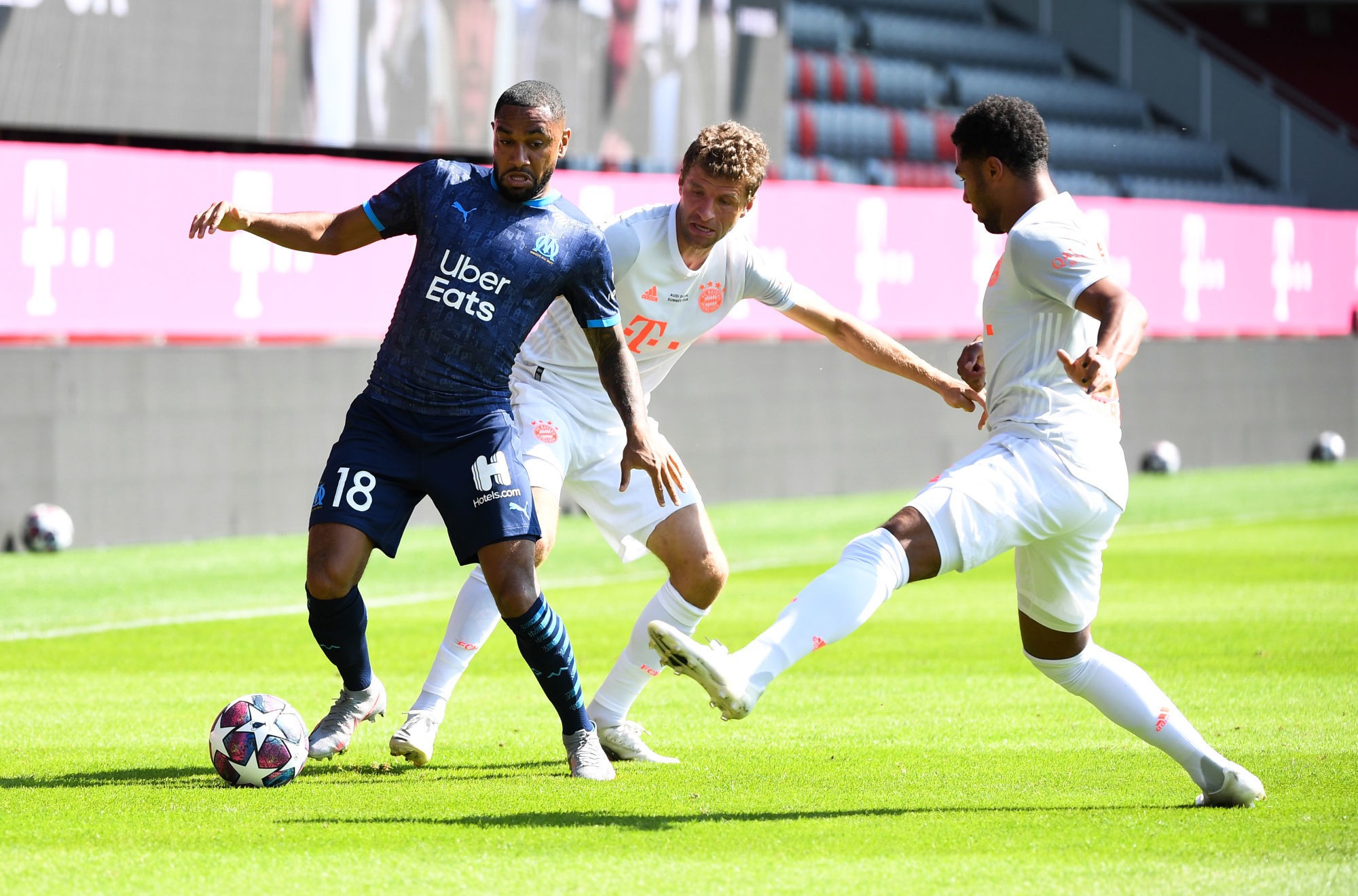 31 July 2020, Bavaria, Munich: Football: Test match, FC Bayern Munich - Olympique Marseille at the FC Bayern junior performance centre. Munich's Thomas M¸ller (M) and Marseilles Jordan Amavi (l) fight for the ball. Photo: Matthias Balk/dpa 

Photo by Icon Sport