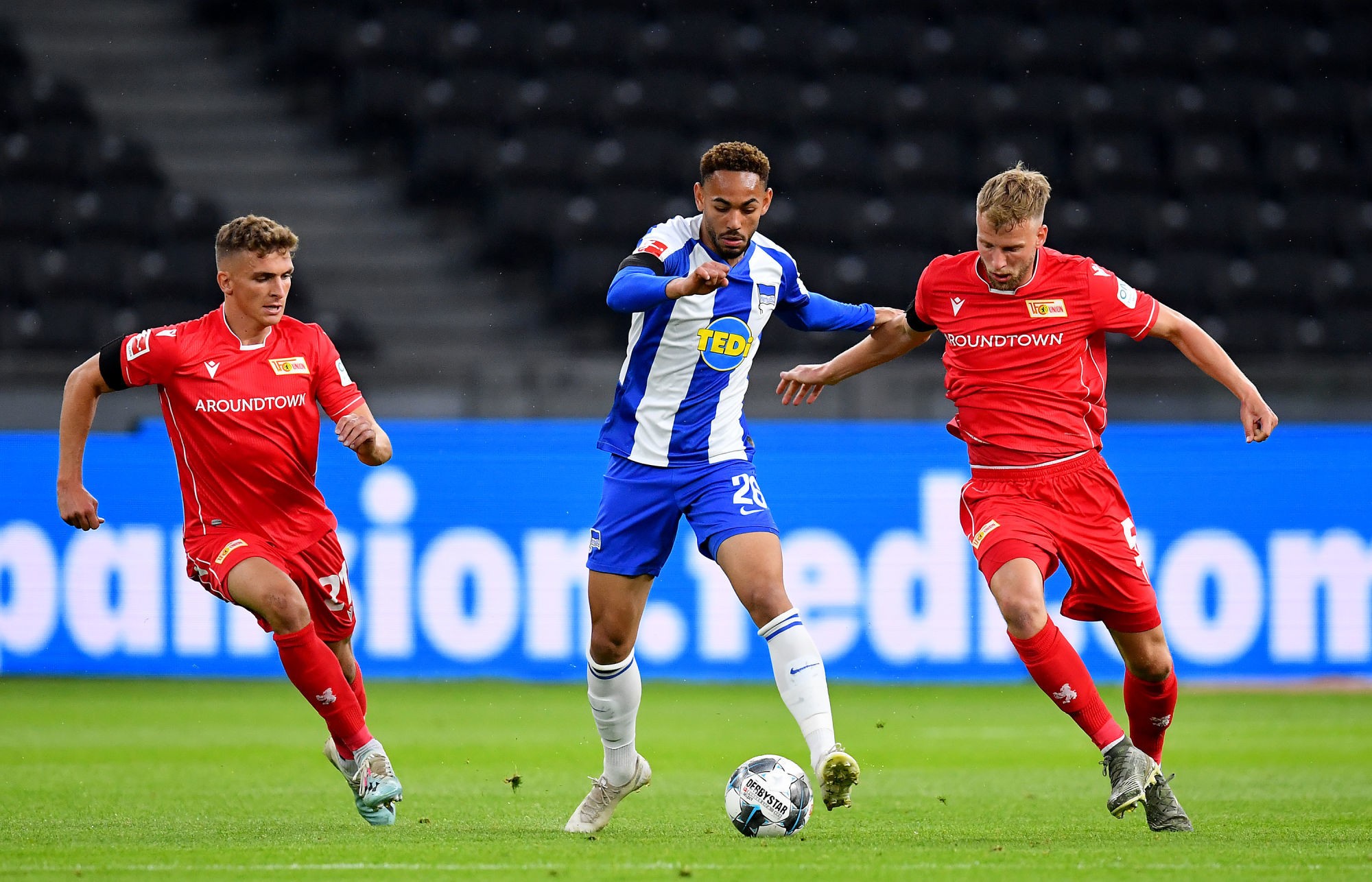 22 May 2020, Berlin: Football: Bundesliga, Hertha BSC - 1 FC Union Berlin, 27th matchday in the Olympic Stadium. Herthas Matheus Cunha (M) in a duel with Unions Grischa Prömel (l) and Marvin Friedrich. Photo: Stuart Franklin/Getty Images Europe/Pool/dpa - only for use in accordance with contractual agreement 
Photo by Icon Sport - Marvin FRIEDRICH - Matheus CUNHA - Grischa PROMEL - Olympiastadion - Berlin (Allemagne)