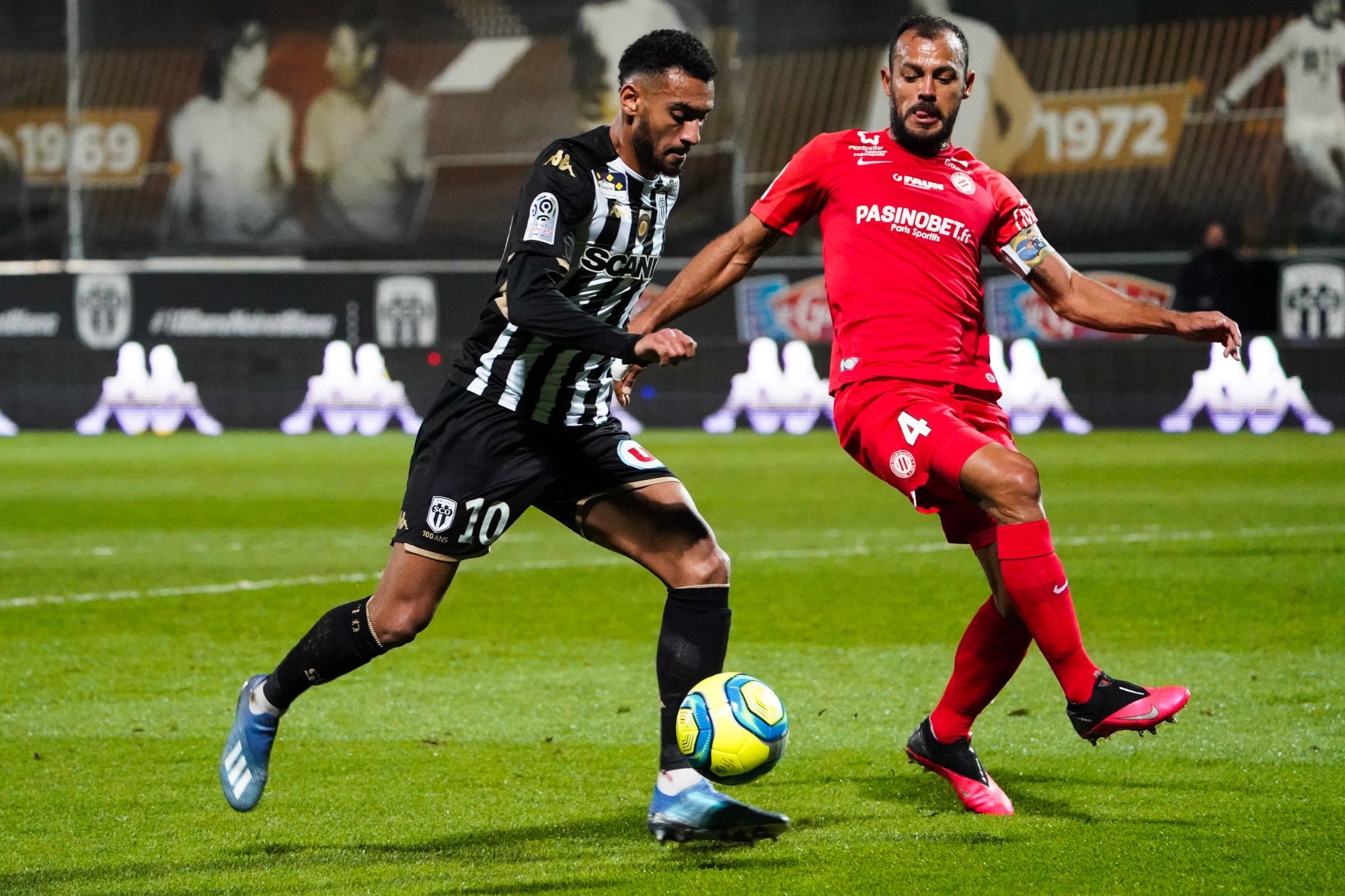 Angelo FULGINI of Angers and Vitorino HILTON of Montpellier during the Ligue 1 match between Angers SCO and Montpellier HSC at Stade Raymond Kopa on February 22, 2020 in Angers, France. (Photo by Eddy Lemaistre/Icon Sport) - Vitorino HILTON - Angelo FULGINI - Stade Raymond Kopa - Angers (France)
