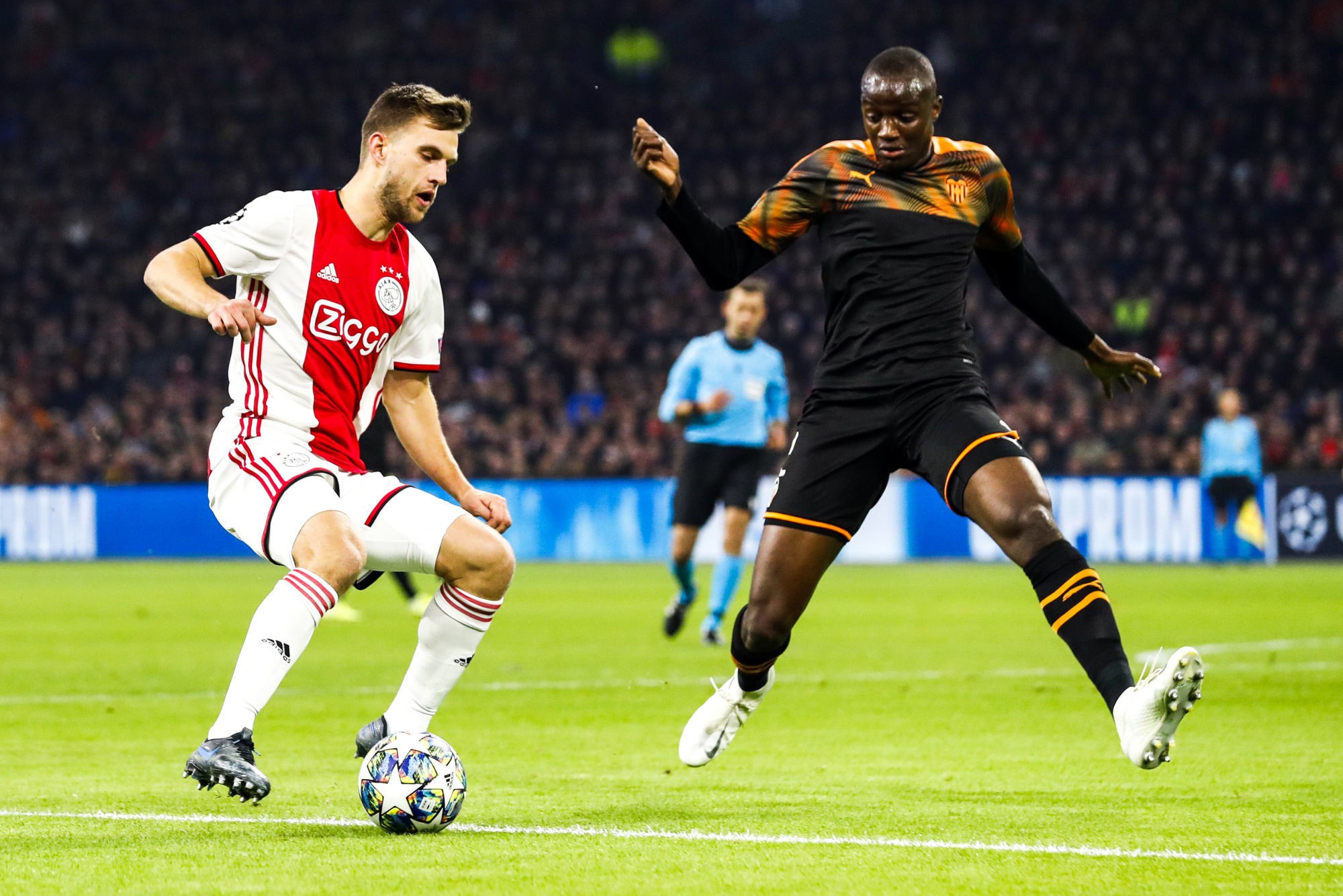 (l-r) Joel Veltman of Ajax, Mouctar Diakhaby of Valencia CF during the UEFA Champions League group H match between Ajax Amsterdam and Valencia CF at the Johan Cruijff Arena on December 11, 2019 in Amsterdam, The Netherlands 
Photo by Icon Sport - Joel VELTMAN - Mouctar DIAKHABY - Johan Cruijff Arena - Amsterdam (Pays Bas)