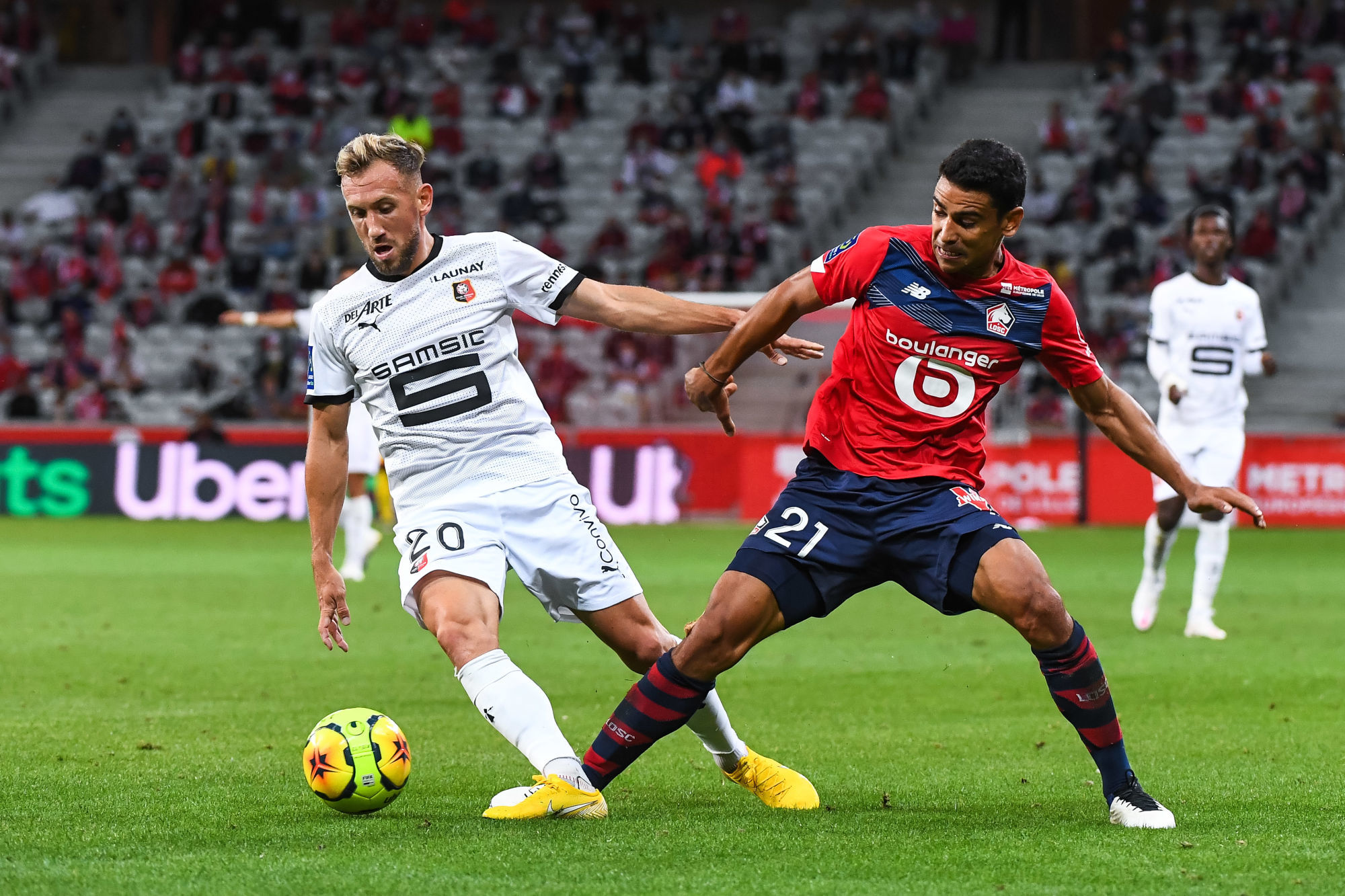 Flavien TAIT of Rennes and Benjamin ANDRE of Lille during the French Ligue 1 soccer match between Lille and Rennes on August 22, 2020 in Lille, France. (Photo by Baptiste Fernandez/Icon Sport) - Stade Pierre Mauroy - Lille (France)