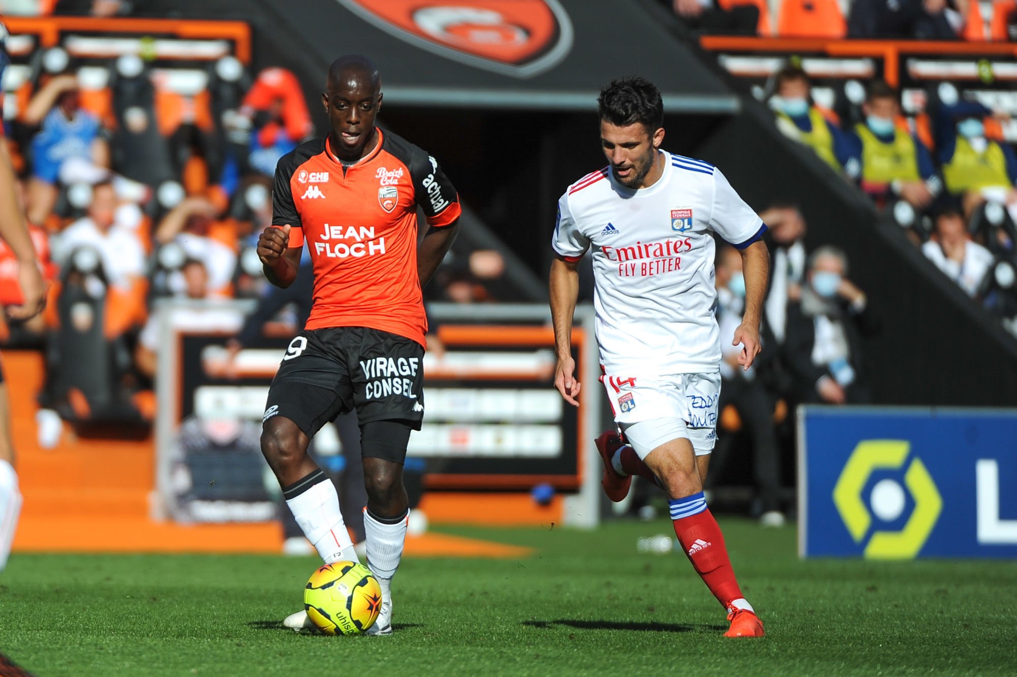 Yoan WISSA - Lorient et Leo DUBOIS - Lyon  (Photo by Johnny Fidelin/Icon Sport)