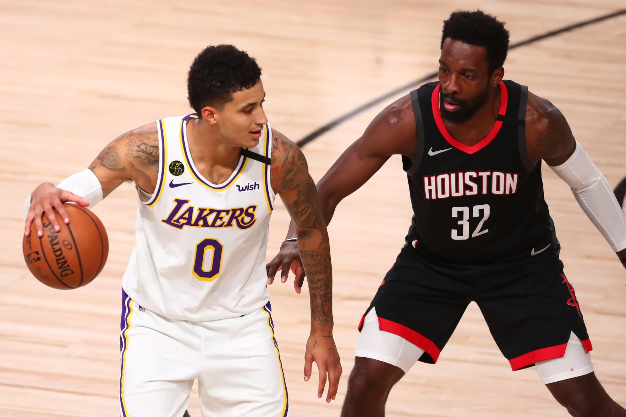 Kyle Kuzma - Los Angeles Lakers et Jeff Green (32) - Houston 
Photo : Icon Sport