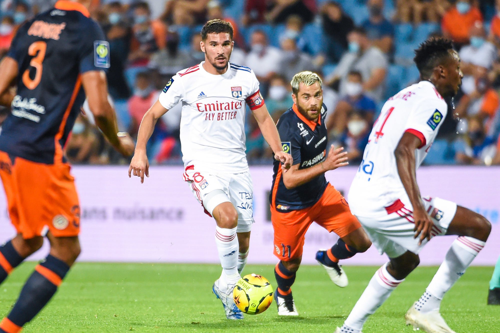 Houssem AOUAR of Lyon and Teji SAVANIER of Montpellier  during the Ligue 1 match between Montpellier and Lyon at Stade de la Mosson on September 15, 2020 in Montpellier, France. (Photo by Alexandre Dimou/Icon Sport) - Houssem AOUAR - Teji SAVANIER - Stade de la Mosson - Montpellier (France)