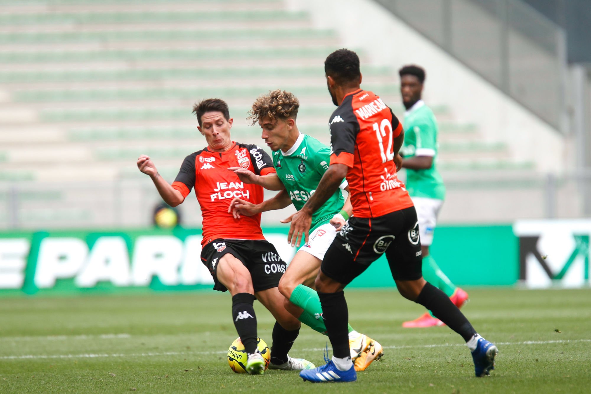 Adil AOUCHICHE of Saint Etienne and Laurent ABERGEL of Lorient during the Ligue 1 match between AS Saint-Etienne and Football Club Lorient, at Geoffroy-Guichard Stadium, Saint-Etienne, France on 30th August 2020. (Photo by Romain Biard/Icon Sport) - Laurent ABERGEL - Adil AOUCHICHE - Stade Geoffroy-Guichard - Saint Etienne (France)