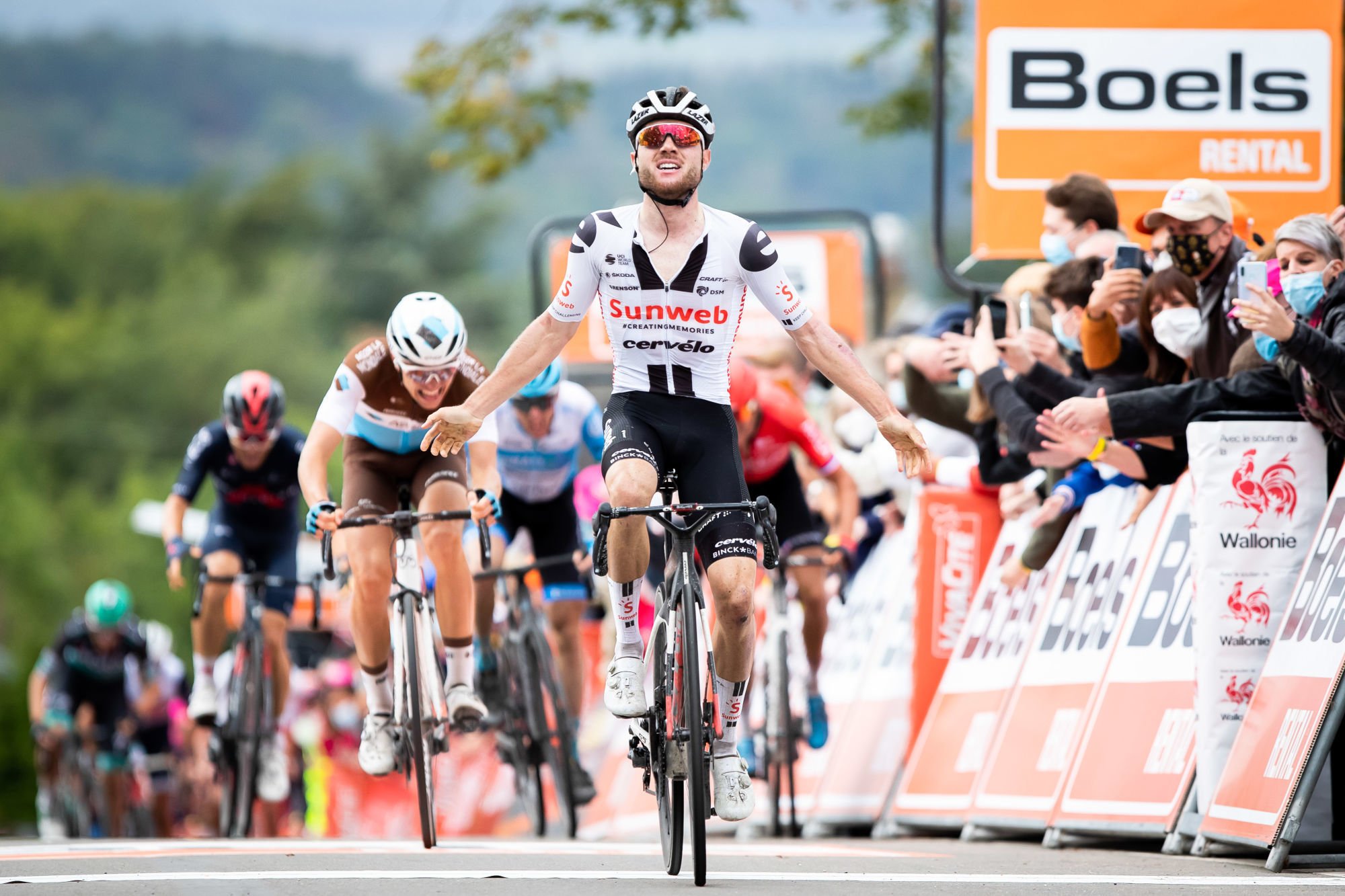 Swiss Marc Hirschi of Team Sunweb celebrates as he crosses the finish line to win the 84th edition of the men's race of 'La Fleche Wallonne', a one day cycling race (Waalse Pijl - Walloon Arrow), 220km from Ans to Huy, Wednesday 30 September 2020. This year's edition was postponed from April to September, due to the ongoing Coronavirus crisis. BELGA PHOTO KRISTOF VAN ACCOM 
By Icon Sport