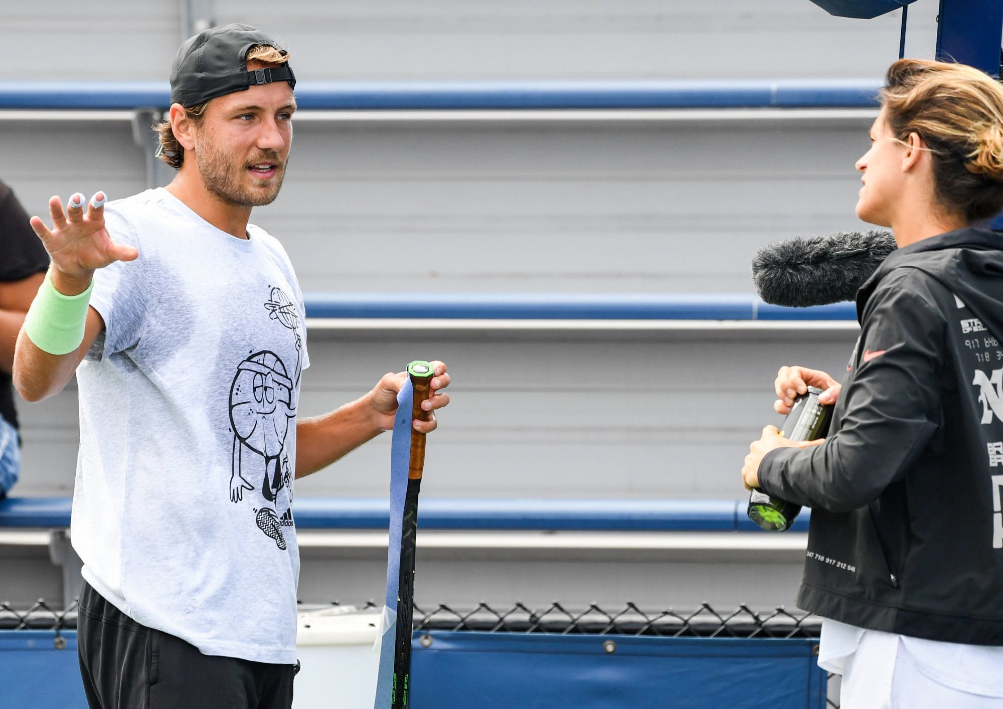 Lucas Pouille  et Amelie Mauresmo - Photo : SUSA / Icon Sport