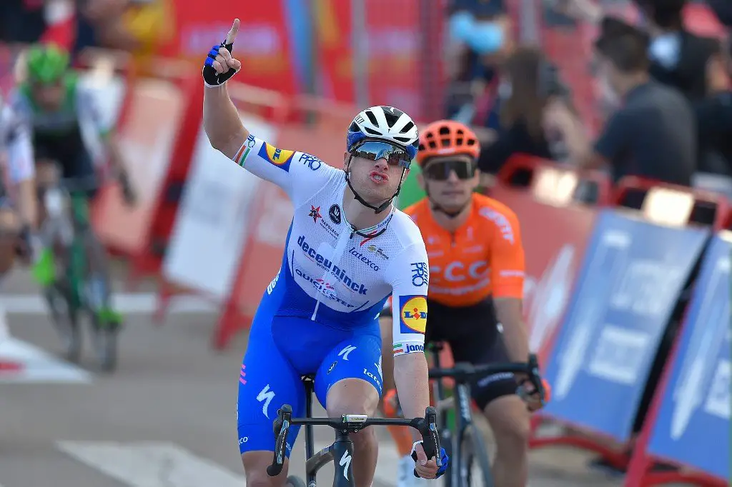 Team Deceuninck's Irish rider Sam Bennett celebrates as he crosses the finish-line in the 4th stage of the 2020 La Vuelta cycling tour of Spain, a 191,7-km race from Garray to Ejea de los Caballeros, on October 23, 2020. (Photo by ANDER GILLENEA / AFP)