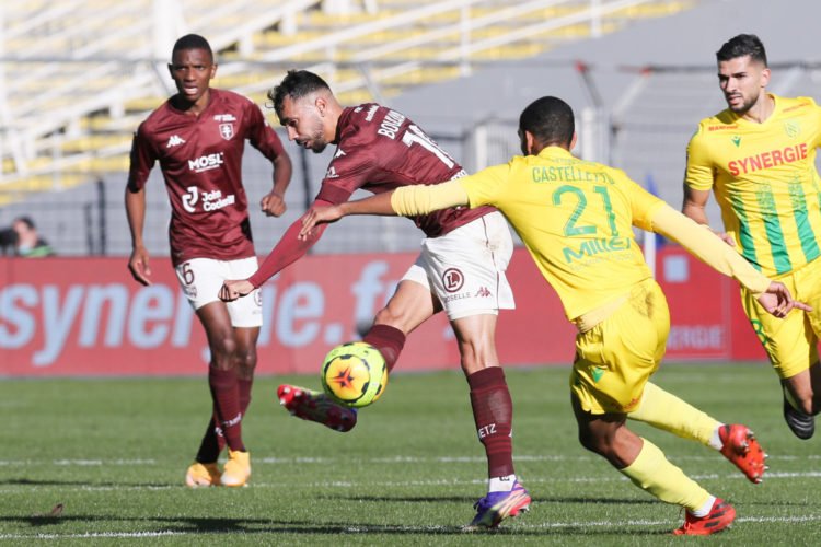 Farid Boulaya of Metz and Jean-Charles Castelletto of Nantes during the Ligue 1 match between FC Nantes and FC Metz at Stade de la Beaujoire on November 22, 2020 in Nantes, France. (Photo by Vincent Michel/Icon Sport) - Stade de La Beaujoire - Louis Fonteneau - Nantes (France)