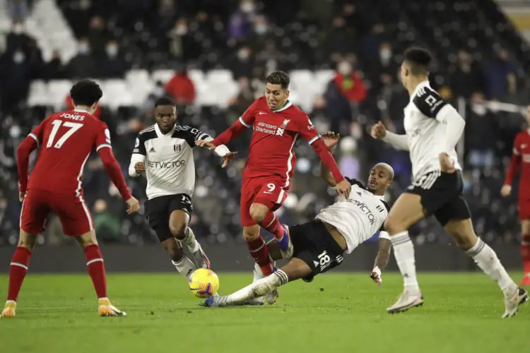 Liverpool's Roberto Firmino (9) is challenged by Fulham's Mario Lemina (18) during the Premier League match at Craven Cottage, London. 
By Icon Sport - Craven Cottage - Londres (Angleterre)