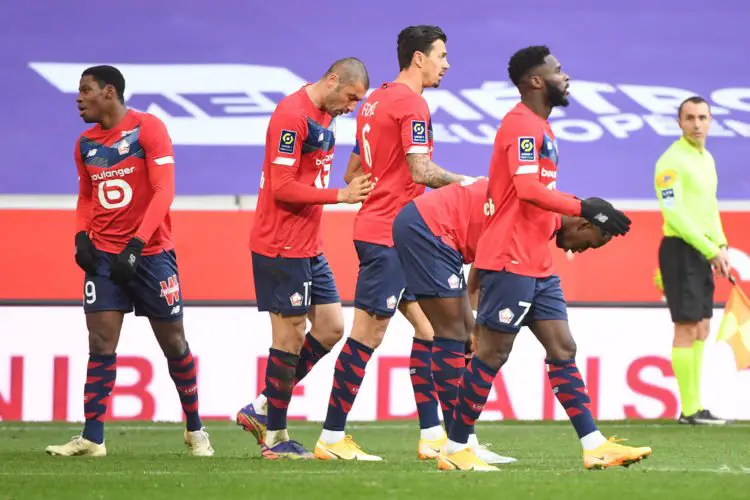 Jonathan DAVID of Lille celebrates a goal with his team mates during the Ligue 1 match between Lille OSC and AS Monaco at Stade Pierre Mauroy on December 6, 2020 in Lille, France. (Photo by Anthony Dibon/Icon Sport) - Jonathan DAVID - Stade Pierre Mauroy - Lille (France)