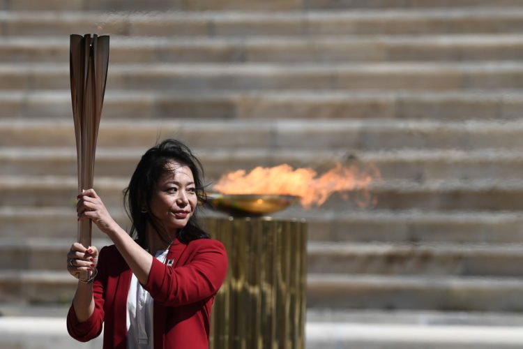 (200319) -- ATHENS, March 19, 2020 (Xinhua) -- Naoko Imoto, an Olympian in swimming at the Olympic Games of Atlanta 1996, holds a torch with the Tokyo Olympic Flame at the Panathenaic stadium, in Athens, Greece, on March 19, 2020. (Photo by Aris Messinis-pool photo/Xinhua) (Photo by Xinhua/Sipa USA) 
Photo by Icon Sport - Naoko IMOTO - Athenes (Grece)