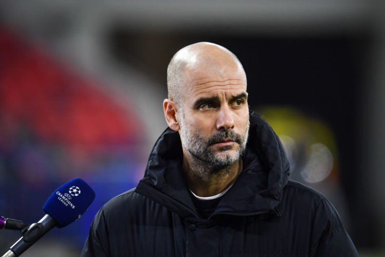 Champions League, Manchester City - Borussia Mˆnchengladbach, knockout round, round of 16, second legs at Puskas Arena. Manchester City coach Pep Guardiola stands during the interview.