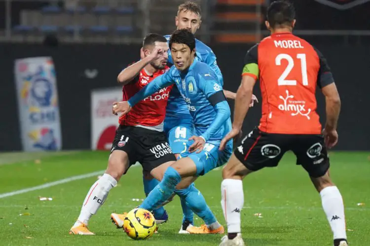 Hiroki SAKAI of Marseille and  Quentin BOISGARD of Lorient during the Ligue 1 match between FC Lorient and Olympique Marseille at Stade du Moustoir on October 24, 2020 in Lorient, France. (Photo by Eddy Lemaistre/Icon Sport) - Hiroki SAKAI - Stade du Moustoir - Lorient (France)
