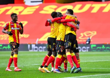 Simon BANZA of Lens celebrates his goal with team mates during the French Ligue 1 soccer match between Lens and Lorient at Stade Bollaert-Delelis on April 11, 2021 in Lens, France. (Photo by Baptiste Fernandez/Icon Sport) - Armand LAURIENTE - --- - Simon BANZA - Ansou SOW - Stade Bollaert-Delelis - Lens (France)