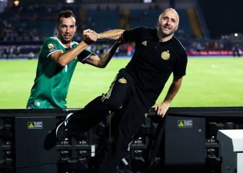 Djamel Benlamri of Algeria and Djamel Belmadi, head coach of Algeria celebrates a victory during the 2019 Africa Cup of Nations Finals, quarterfinals match between Ivory Coast and Algeria at Suez Stadium, Suez, Egypt on 11 July 2019 Photo : PA Images / Icon Sport