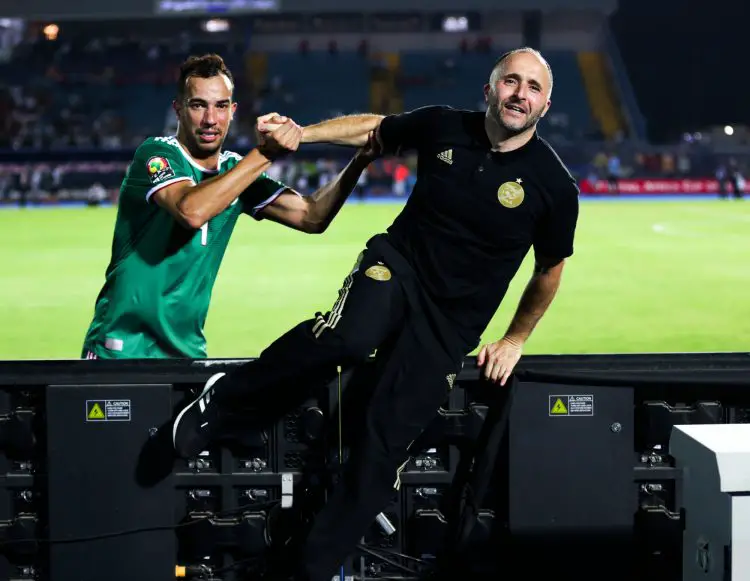 Djamel Benlamri of Algeria and Djamel Belmadi, head coach of Algeria celebrates a victory during the 2019 Africa Cup of Nations Finals, quarterfinals match between Ivory Coast and Algeria at Suez Stadium, Suez, Egypt on 11 July 2019 Photo : PA Images / Icon Sport