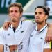 Nicolas MAHUT of France and Pierre Hugues HERBERT of France celebrate their victory with the trophy during the tenth round of Roland Garros at Roland Garros on June 12, 2021 in Paris, France. (Photo by Baptiste Fernandez/Icon Sport) - Nicolas MAHUT - Pierre Hugues HERBERT - Roland Garros - Paris (France)