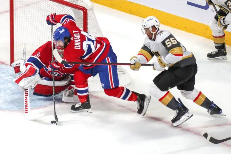 Jun 20, 2021; Montreal, Quebec, CAN; Montreal Canadiens left wing Phillip Danault (24) helps goaltender Carey Price (31) to make a save against Vegas Golden Knights right wing Keegan Kolesar (55) during the third period in game four of the 2021 Stanley Cup Semifinals at Bell Centre. Mandatory Credit: Jean-Yves Ahern-USA TODAY Sports/Sipa USA 
Photo by Icon Sport - Phillip DANAULT - Olympic Stadium - Montreal (Canada)