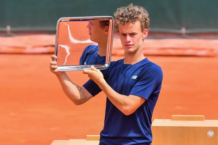 Lucas VAN ASSCHE of France celebrates with the trophy during the tenth round of Roland Garros at Roland Garros on June 12, 2021 in Paris, France. (Photo by Baptiste Fernandez/Icon Sport) - Roland Garros - Paris (France)