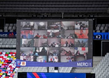 A giant screen shows fans watching the game from home via video conference during the RBS Six Nations match between France and Scotland at Stade de France on March 26, 2021 in Paris, France. (Photo by Baptiste Fernandez/Icon Sport) - --- - Stade de France - Paris (France)