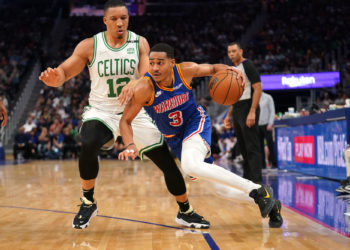 Mar 16, 2022; San Francisco, California, USA; Golden State Warriors guard Jordan Poole (3) dribbles past Boston Celtics forward Grant Williams (12) in the second quarter at the Chase Center. Mandatory Credit: Cary Edmondson-USA TODAY Sports/Sipa USA - Photo by Icon sport