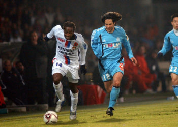 Sidney GOVOU / Jerome BONNISSEL - Lyon / Marseille - 11.01.2006 - 21eme Journee de Ligue 1 - Photo by icon sport