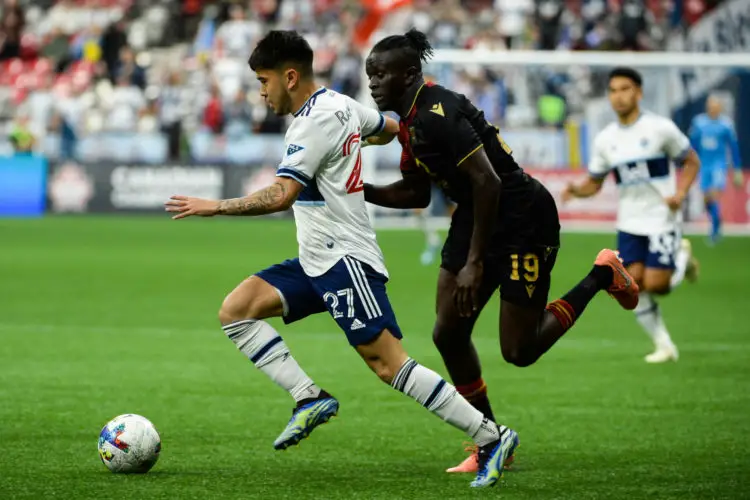 May 11, 2022; Vancouver, British Columbia, Canada; Vancouver Whitecaps midfielder Ryan Raposo (27) controls the ball against against Valour FC forward William Akio (19) during the first half at BC Place. Mandatory Credit: Anne-Marie Sorvin-USA TODAY Sports/Sipa USA - Photo by Icon sport