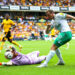 Newcastle United's Chris Wood (right) attempts a shot past Wolverhampton Wanderers goalkeeper Jose Sa during the Premier League match at the Molineux Stadium, Wolverhampton. Picture date: Sunday August 28, 2022. - Photo by Icon sport
