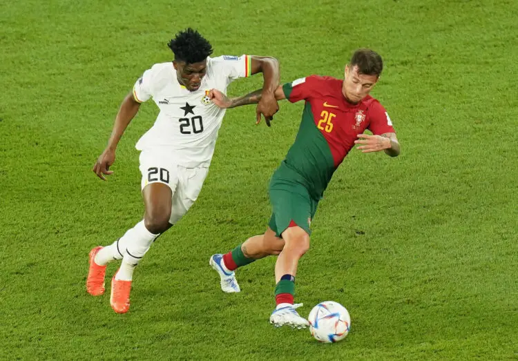 Ghana's Mohammed Kudus (left) and Portugal's Otavio battle for the ball during the FIFA World Cup Group H match at Stadium 974 in Doha, Qatar. Picture date: Thursday November 24, 2022. - Photo by Icon sport