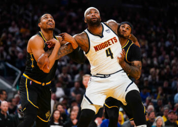 Apr 27, 2022; San Francisco, California, USA; Denver Nuggets center DeMarcus Cousins (4) battles for position with Golden State Warriors forward Otto Porter Jr. (32) and guard Gary Payton II (0) in the fourth quarter during game five of the first round for the 2022 NBA playoffs at Chase Center. Mandatory Credit: Cary Edmondson-USA TODAY Sports/Sipa USA - Photo by Icon sport