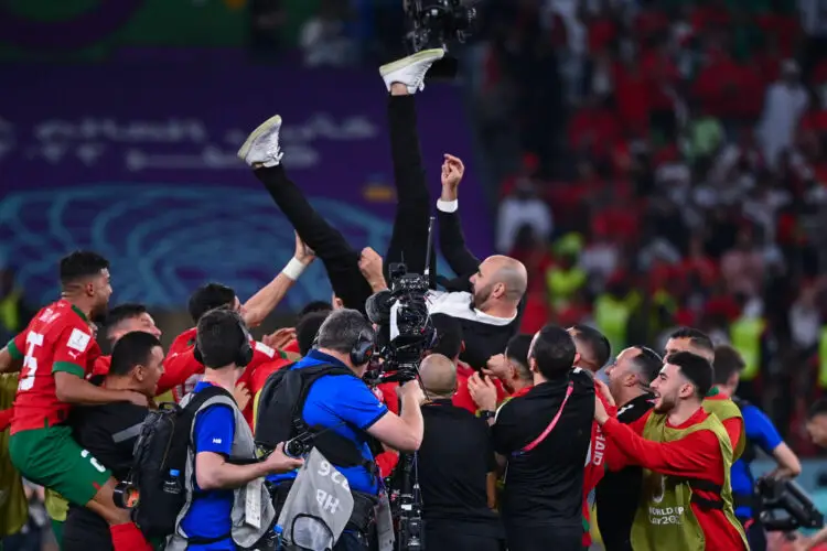 Team of Morocco celebrates the victory with Walid REGRAGUI head coach of Morocco during the FIFA World Cup 2022, Round of 16 match between Morocco and Spain at Education City Stadium on December 6, 2022 in Doha, Qatar. (Photo by Anthony Dibon/Icon Sport)