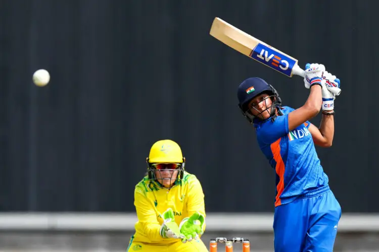 India's Harmanpreet Kaur hits for 4 against Australia, during the Twenty20 cricket match at Edgbaston Stadium on day one of 2022 Commonwealth Games in Birmingham. Picture date: Friday July 29, 2022. - Photo by Icon sport