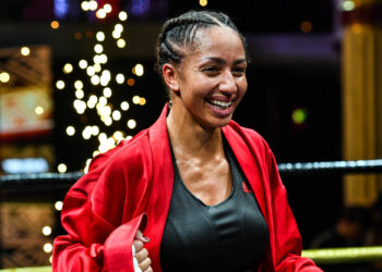 Estelle Mossely of France celebrates her victory over Anisha Basheel of Malawi during an IBO world championship fight at Salle Wagram on February 17, 2023 in Paris, France. (Photo by Baptiste Fernandez/Icon Sport)