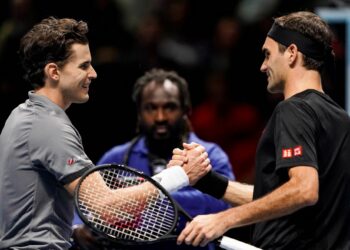 Dominic Thiem et Roger Federer - Photo by Icon Sport