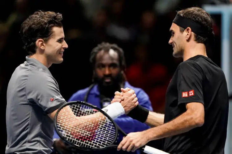 Dominic Thiem et Roger Federer - Photo by Icon Sport