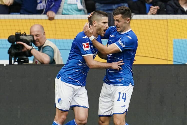 18 March 2023, Baden-Württemberg, Sinsheim: Soccer: Bundesliga, TSG 1899 Hoffenheim - Hertha BSC, Matchday 25, PreZero Arena. Hoffenheim's Andrej Kramaric (l) celebrates with teammate Christoph Baumgartner after scoring the 2:0 from the penalty spot. Photo: Uwe Anspach/dpa - IMPORTANT NOTE: In accordance with the requirements of the DFL Deutsche Fußball Liga and the DFB Deutscher Fußball-Bund, it is prohibited to use or have used photographs taken in the stadium and/or of the match in the form of sequence pictures and/or video-like photo series. - Photo by Icon sport
