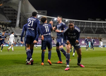 Kevin MBALA of Paris FC celebrate next to Teammates during the Ligue 2 BKT match between Paris and Niort at Stade Charlety on February 25, 2023 in Paris, France. (Photo by Hugo Pfeiffer/Icon Sport)