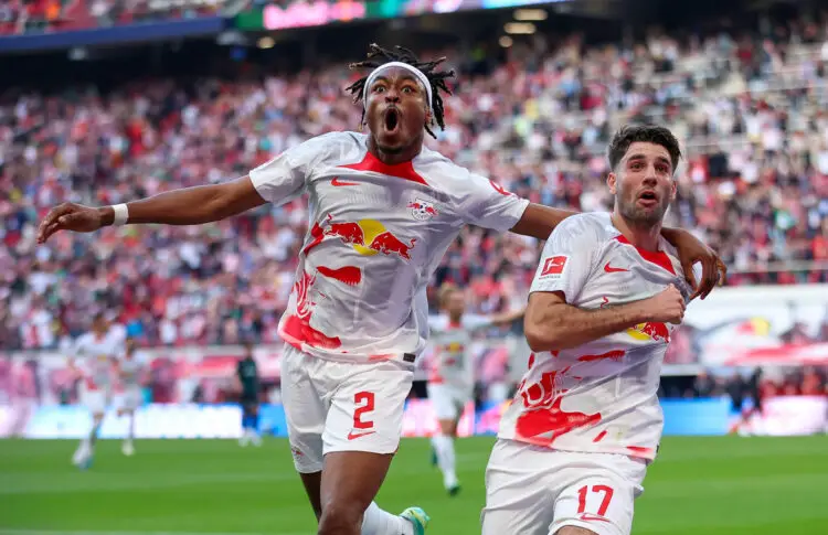 14 May 2023, Saxony, Leipzig: Soccer: Bundesliga, Matchday 32, RB Leipzig - Werder Bremen at the Red Bull Arena. Leipzig's Mohamed Simakan (l) and Dominik Szoboszlai celebrate after Szoboszlai's goal for 2:1. Photo: Jan Woitas/dpa - IMPORTANT NOTE: In accordance with the requirements of the DFL Deutsche Fuball Liga and the DFB Deutscher Fuball-Bund, it is prohibited to use or have used photographs taken in the stadium and/or of the match in the form of sequence pictures and/or video-like photo series. - Photo by Icon sport