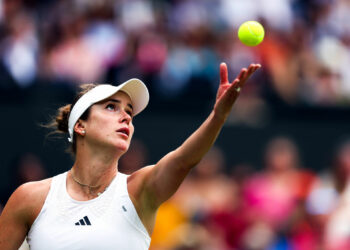 Elina Svitolina in action against Iga Swiatek during their ladies quarter final match on day nine of the 2023 Wimbledon Championships at the All England Lawn Tennis and Croquet Club in Wimbledon. Picture date: Tuesday July 11, 2023. - Photo by Icon sport
